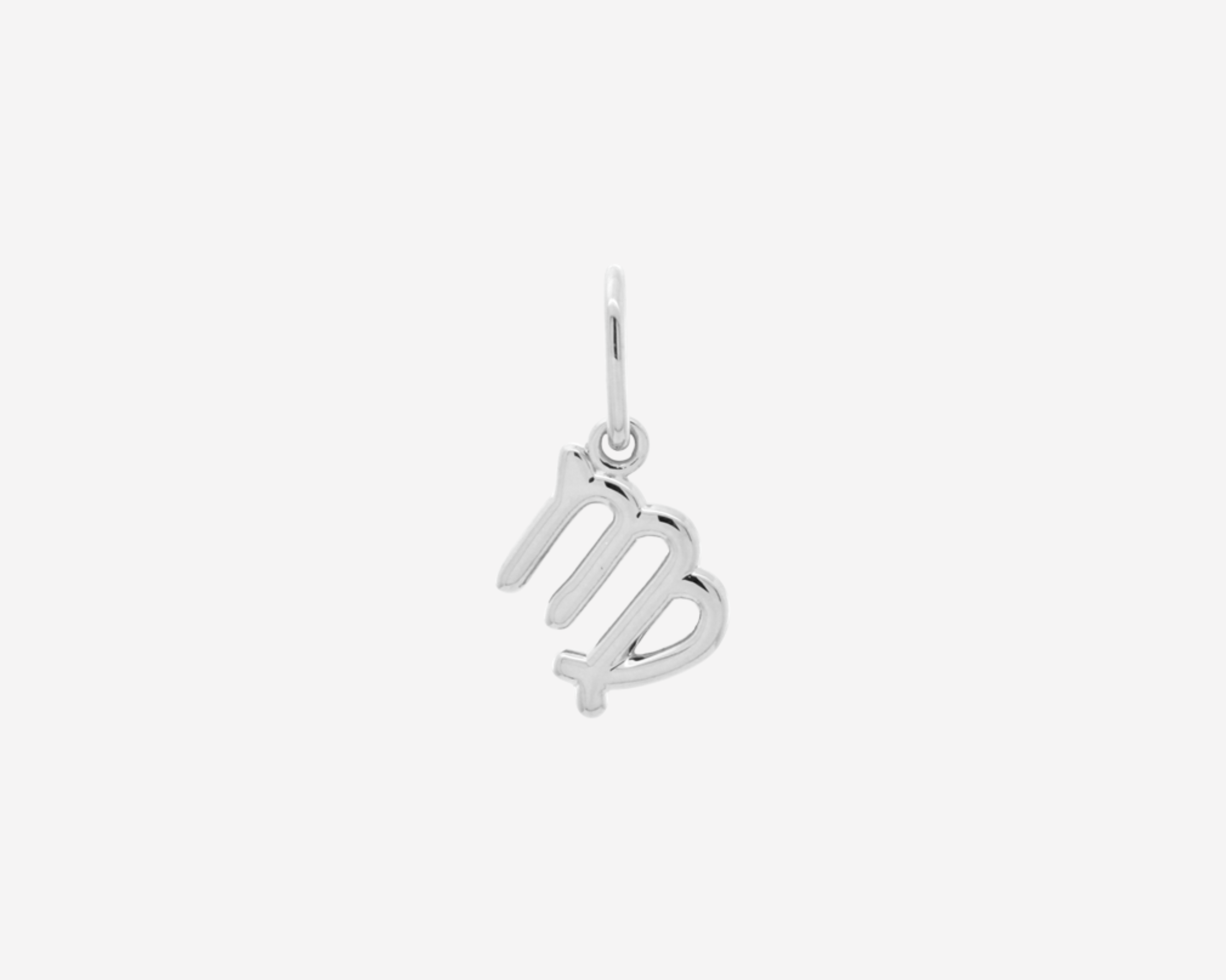 Şener Besim Virgo Charm in silver rhodium plating, flat lay