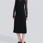 Şener Besim Y Back Dress in black — front view, midi length with V-neckline