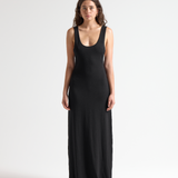 model in sener besim low scoop full length dress in black