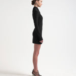 model side view wearing bonded dress by sener besim