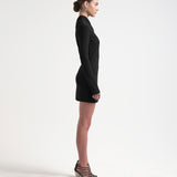model side view wearing bonded dress by sener besim