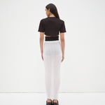 back view of model wearing everyday crop tee by sener besim