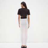 back view of model wearing everyday crop tee by sener besim