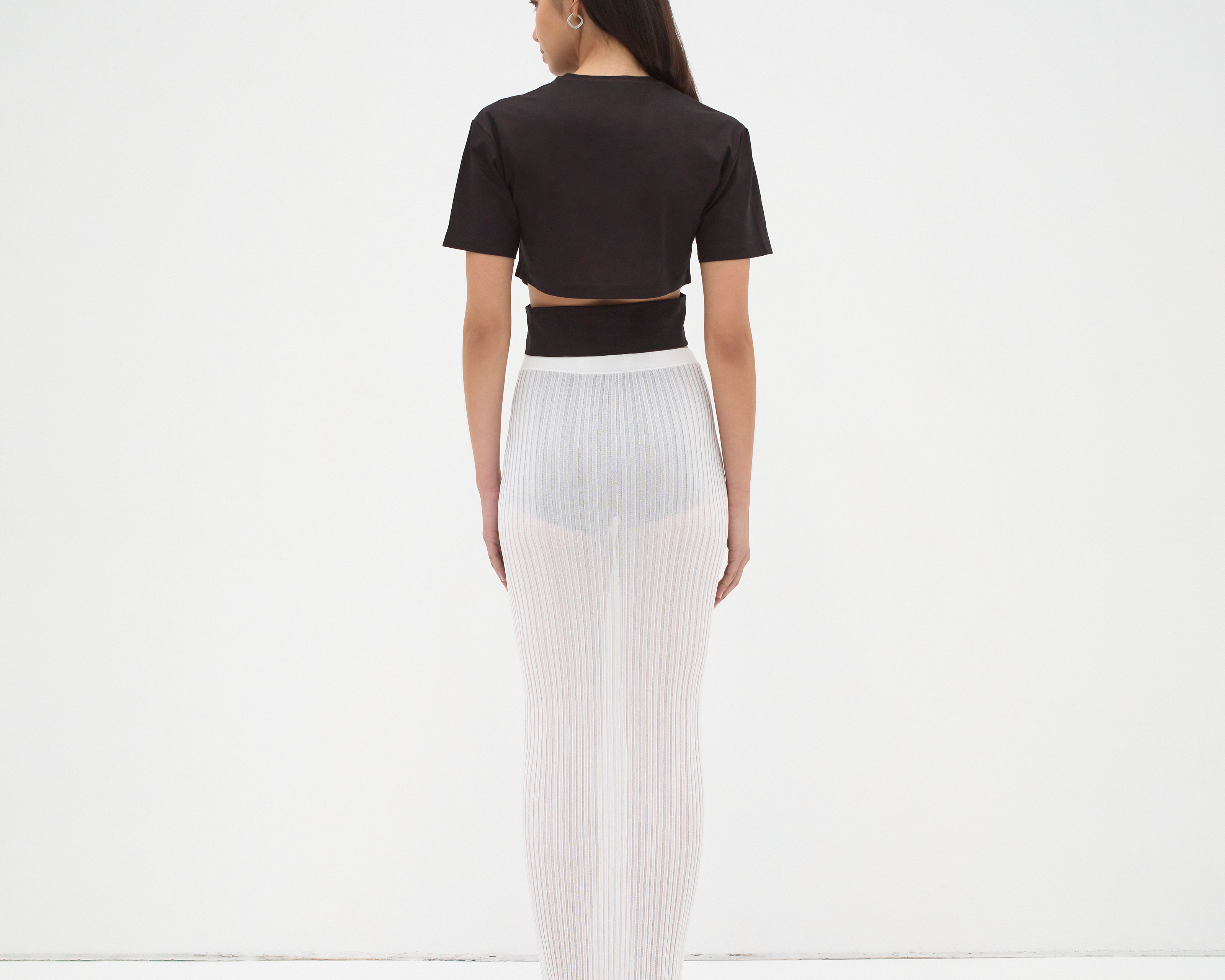 back view of model wearing everyday crop tee by sener besim