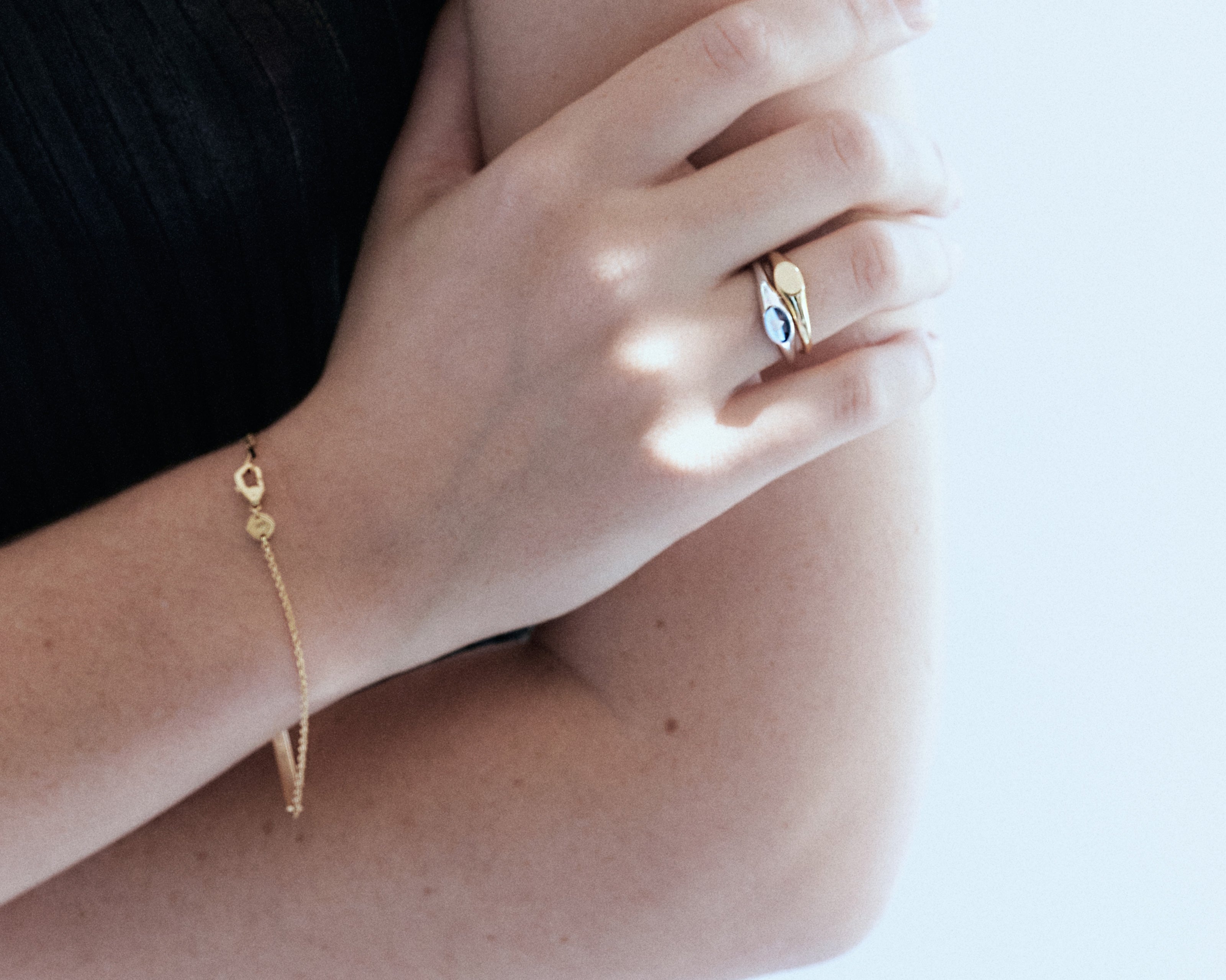 fine signet ring on model stack rings sener besim