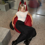long pencil skirt by sener besim on model violet grace styled with boots