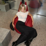 long pencil skirt by sener besim on model violet grace styled with boots