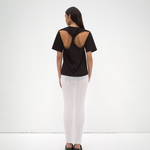 sener besim twist back tee on model with cut out detail
