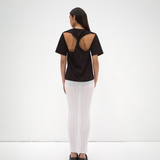 sener besim twist back tee on model with cut out detail