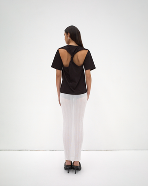 sener besim twist back tee on model with cut out detail