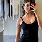 influencer model wearing sener besim twisted strap dress in store