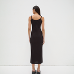 twisted strap singlet slip dress back view on model in black by sener besim