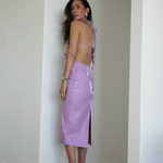 sener besim tie back vegan leather dress worn by model 