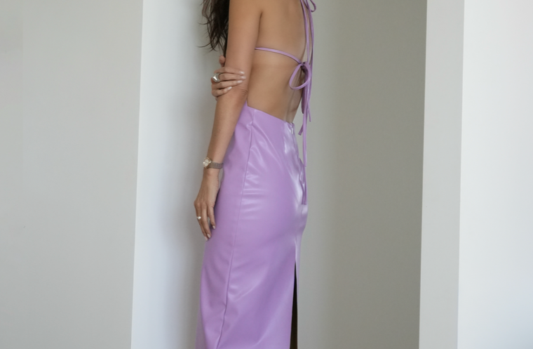 sener besim tie back vegan leather dress worn by model 