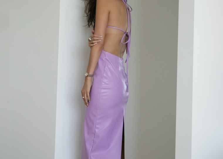 sener besim tie back vegan leather dress worn by model 