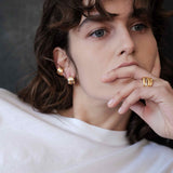 Şener Besim Dynasty Ear Cuff gold and silver worn on ear