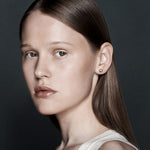 Şener Besim Large Constellation Diamond Stud silver worn on ear, editorial shot