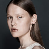 Şener Besim Large Constellation Diamond Stud silver worn on ear, editorial shot
