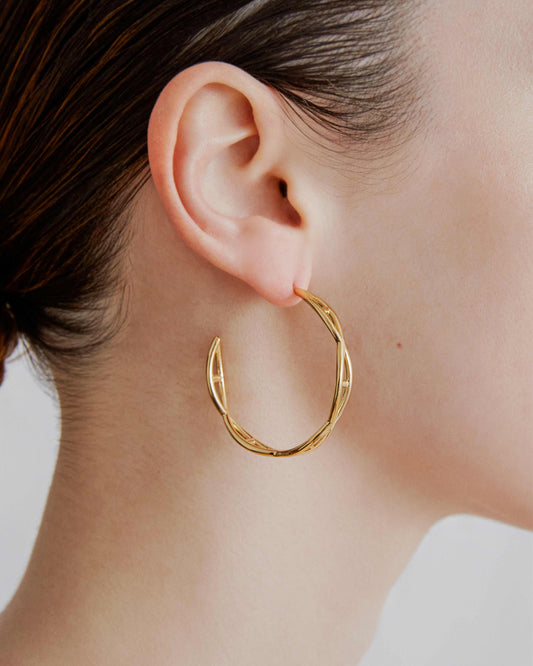     sener-besim-large-helix-hoop-gold-earrings