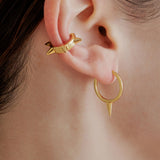 sener-besim-large-single-point-huggie-gold-earrings