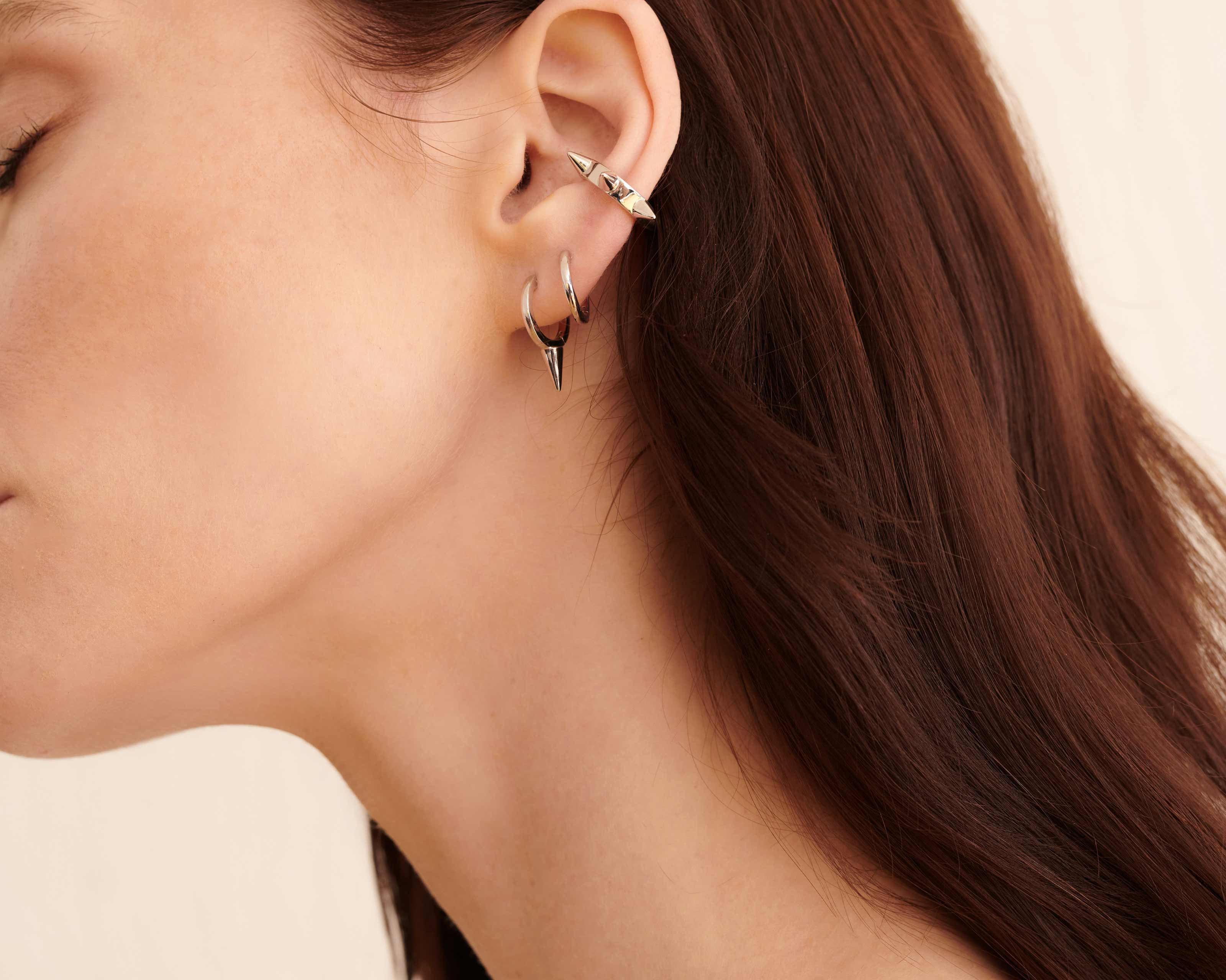 Şener Besim Multipoint Ear Cuff silver worn on ear, Spike Series, rhodium plating