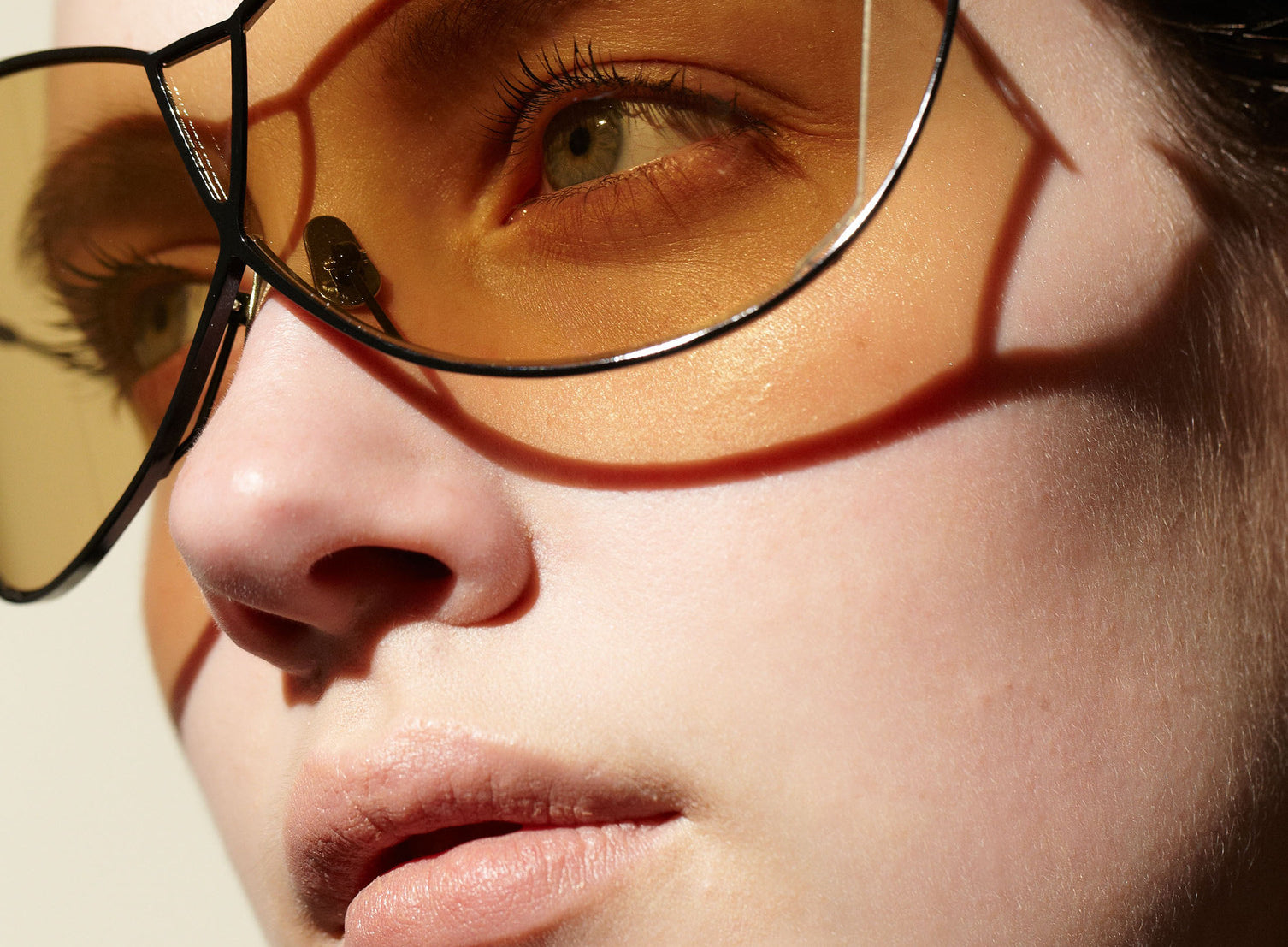Şener Besim S1 sunglasses in nero and champagne worn, handcrafted titanium frame