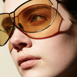 Şener Besim S1 sunglasses in nero and champagne worn, handcrafted titanium frame