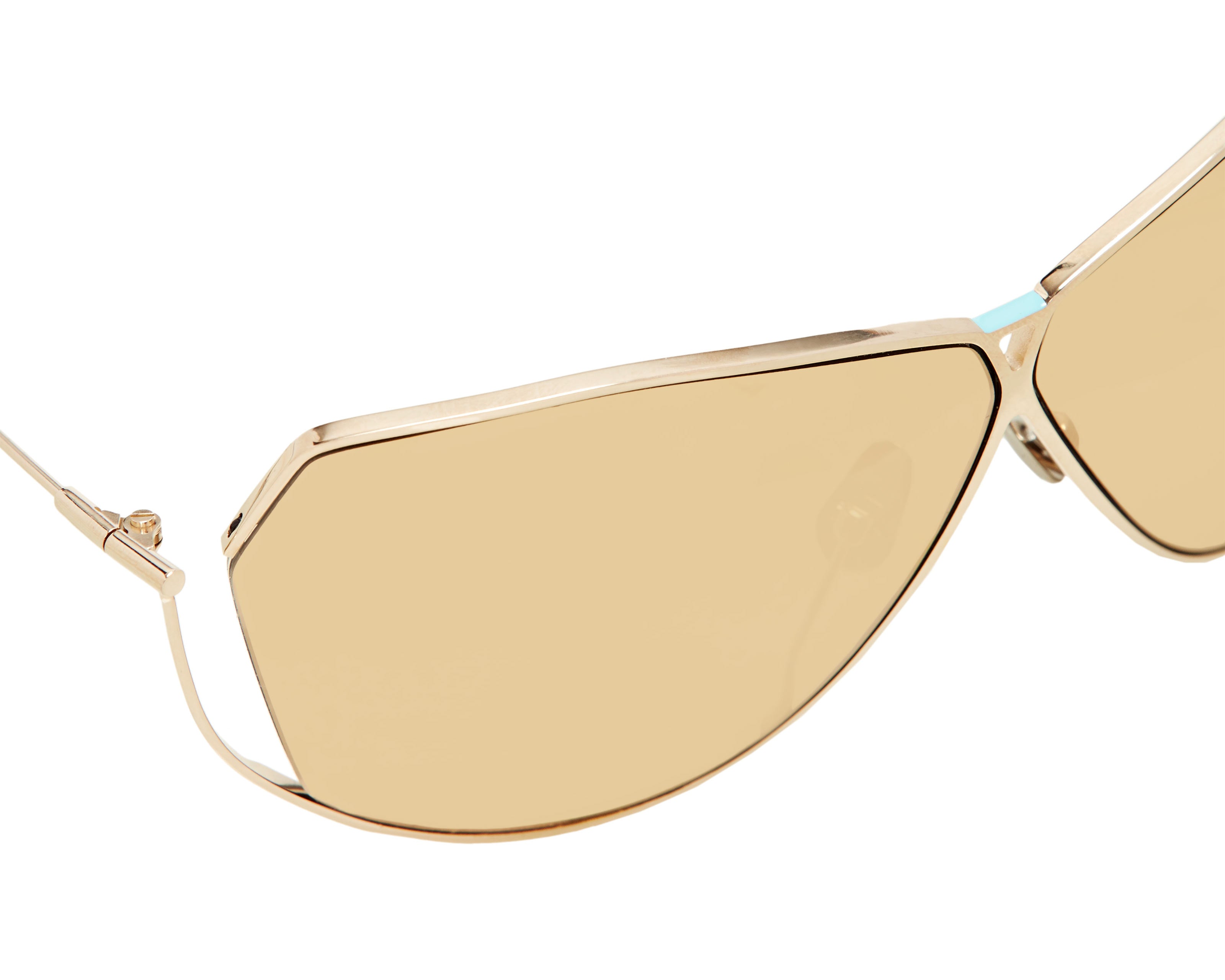 Şener Besim S2 sunglasses in aurous gold, aviation grade titanium frame, close up