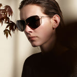 Şener Besim S2 sunglasses aurous graphite worn, titanium frame, side profile