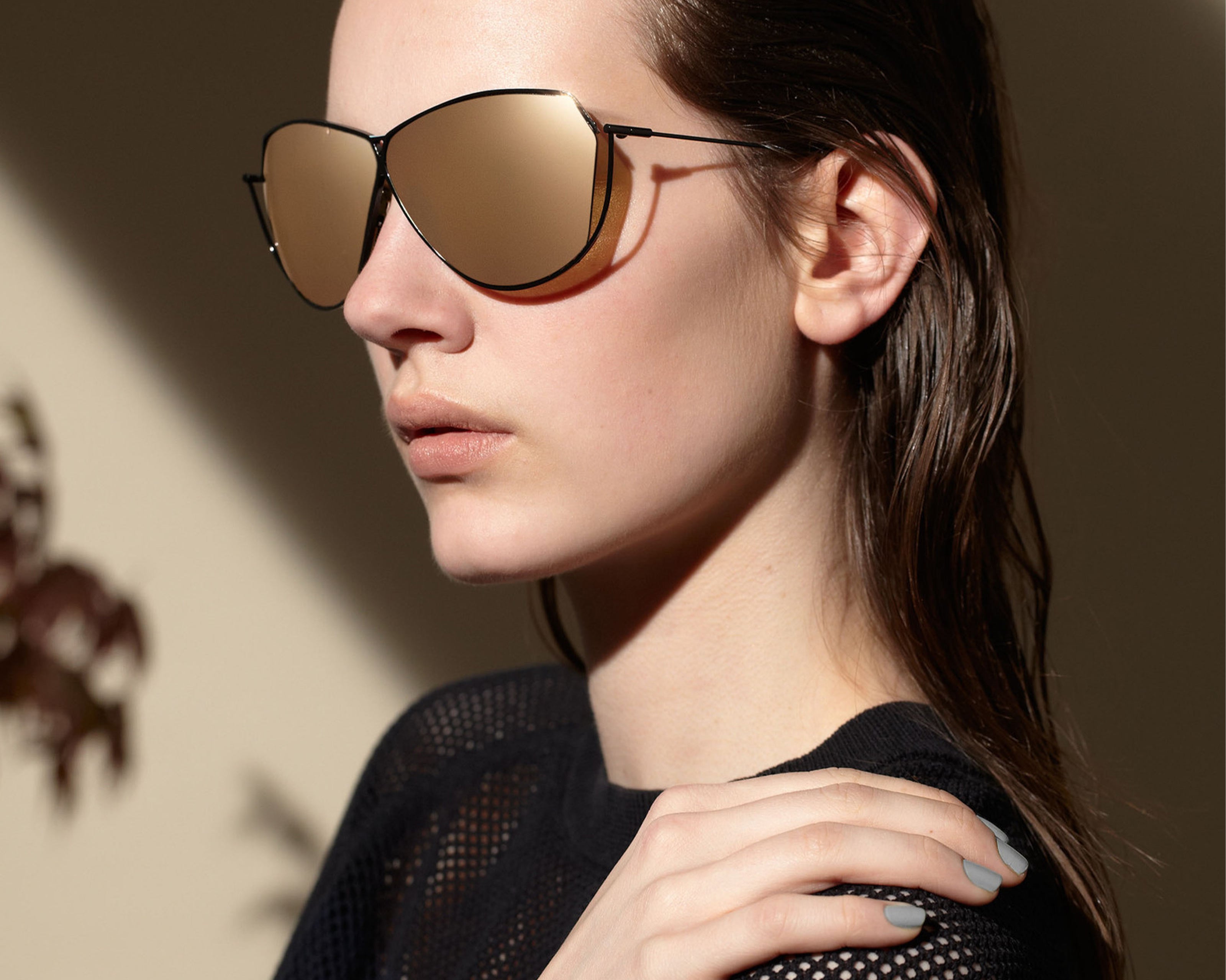 Şener Besim S2 sunglasses nero gold worn, lifestyle shot