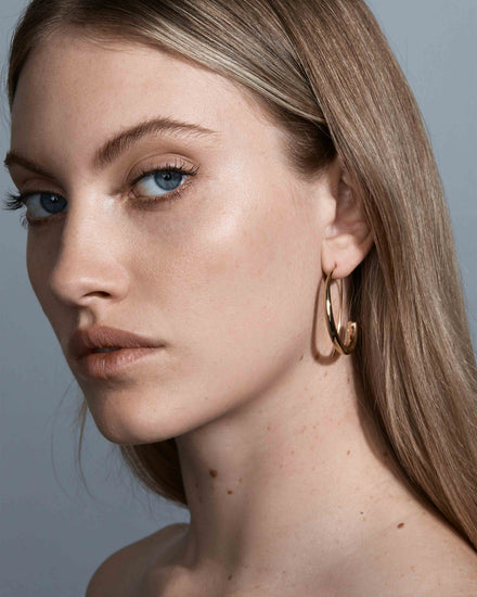 sener-besim-spiral-hoop-gold-earrings