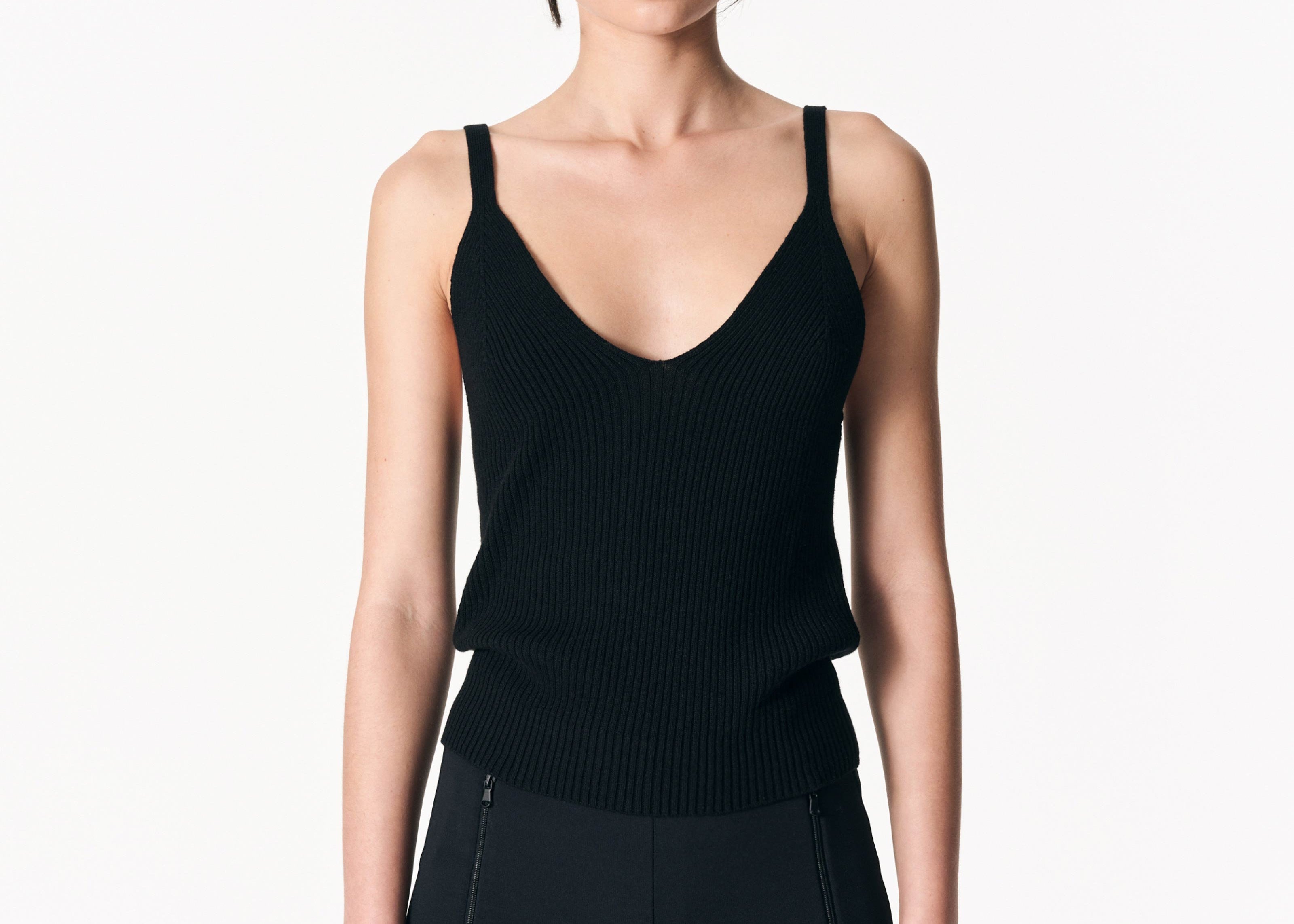 model wearing ribbed singlet knit stretch fabric by sener besim