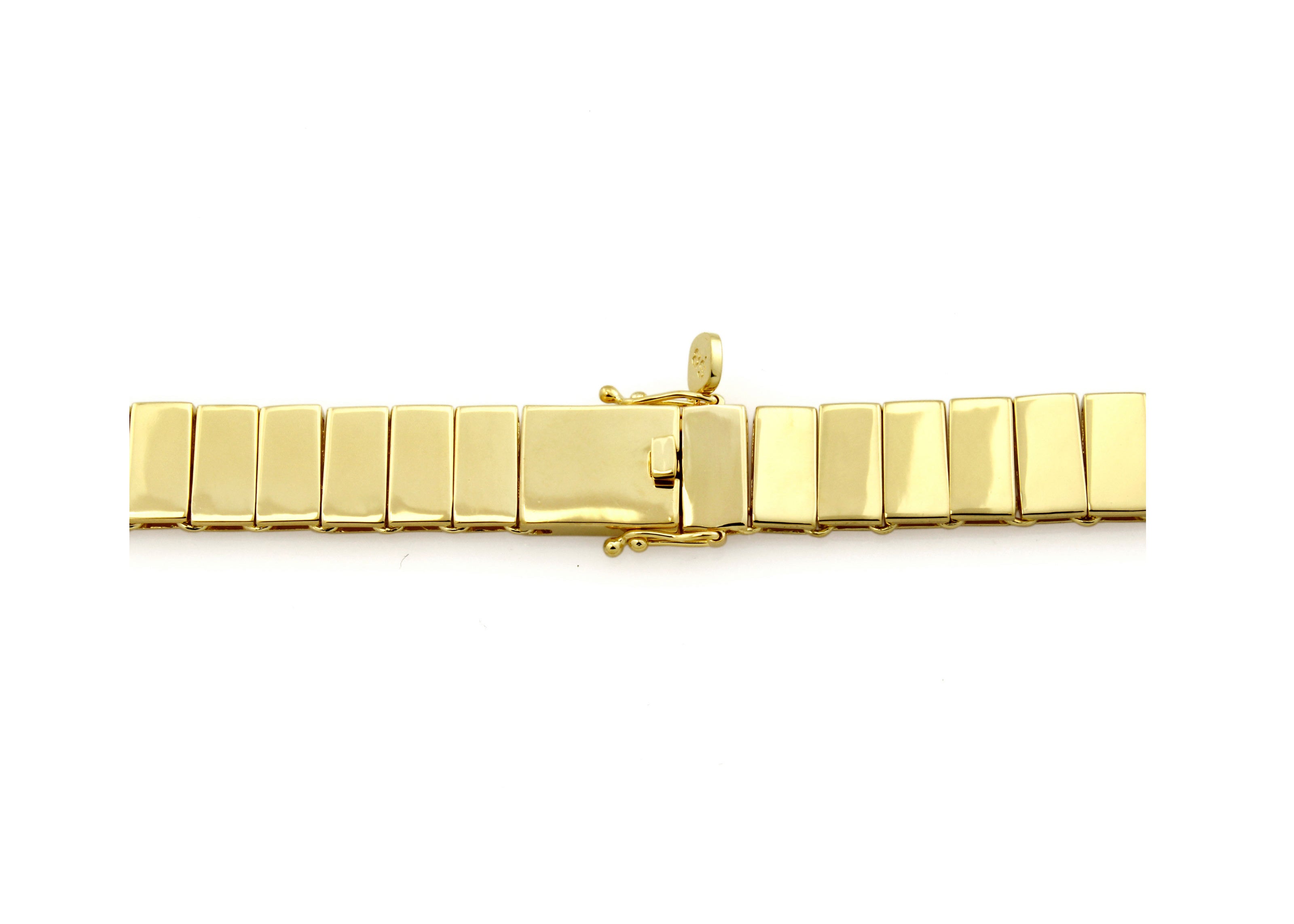 tennis bracelet close up in gold by sener besim